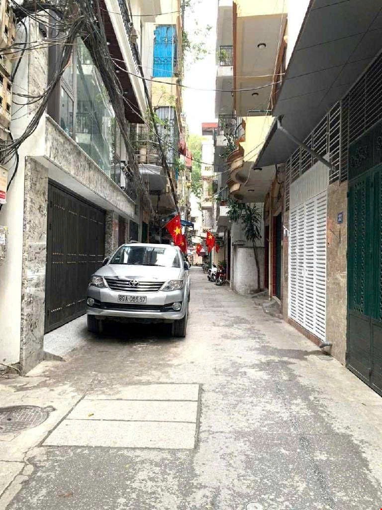 ban-nha-hong-mai-5-tang-long-lanh-o-to-tranh-kinh-doanh-hai-ba-trung-pr144342